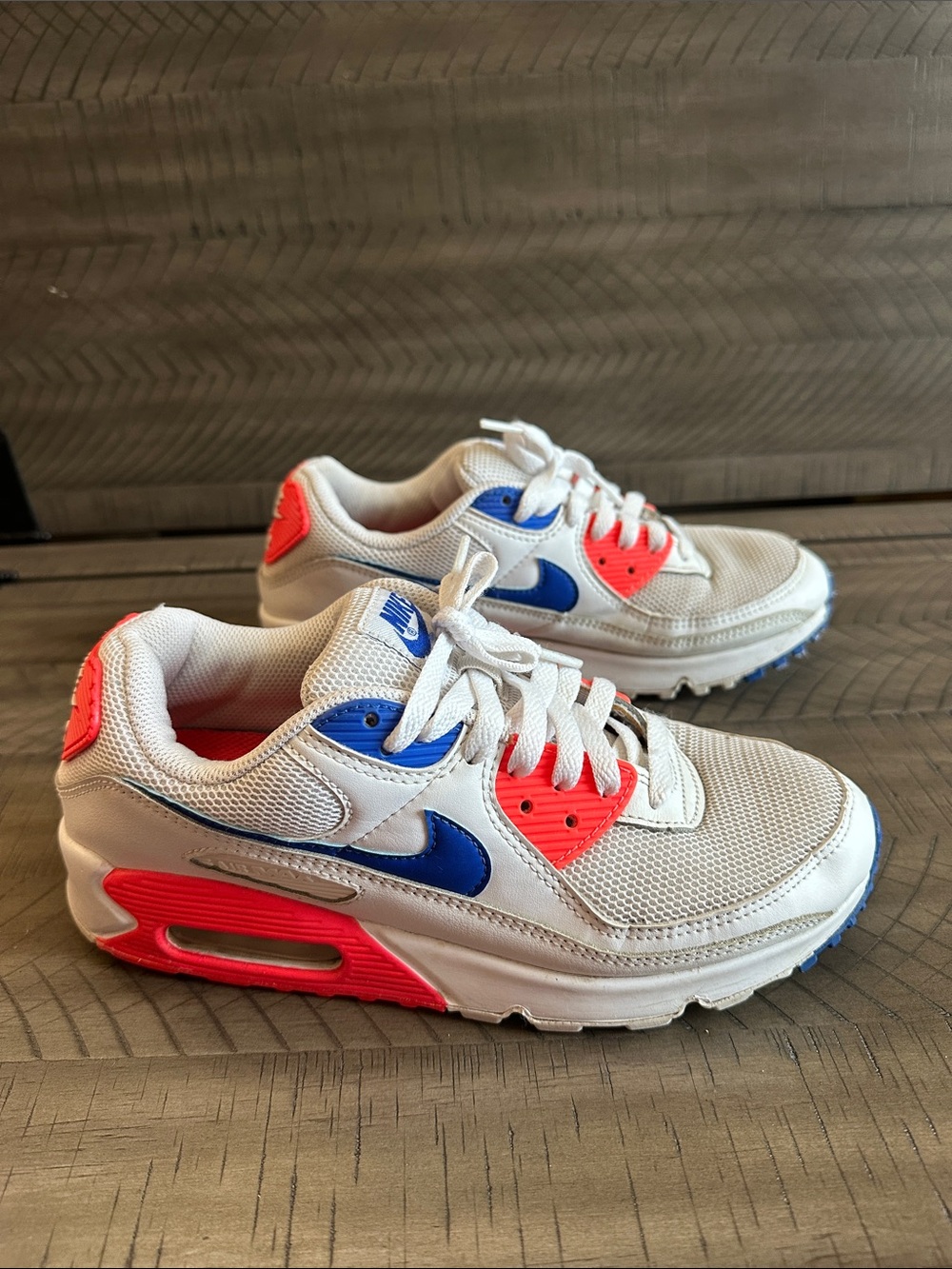 Nike Air Max 90 White Sneakers with Blue Swoosh and Neon Orange Accents